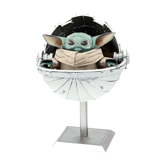 Metal Earth ICONX 3D model kit featuring The Child in a hovering pod with opening dome, displayed on stand