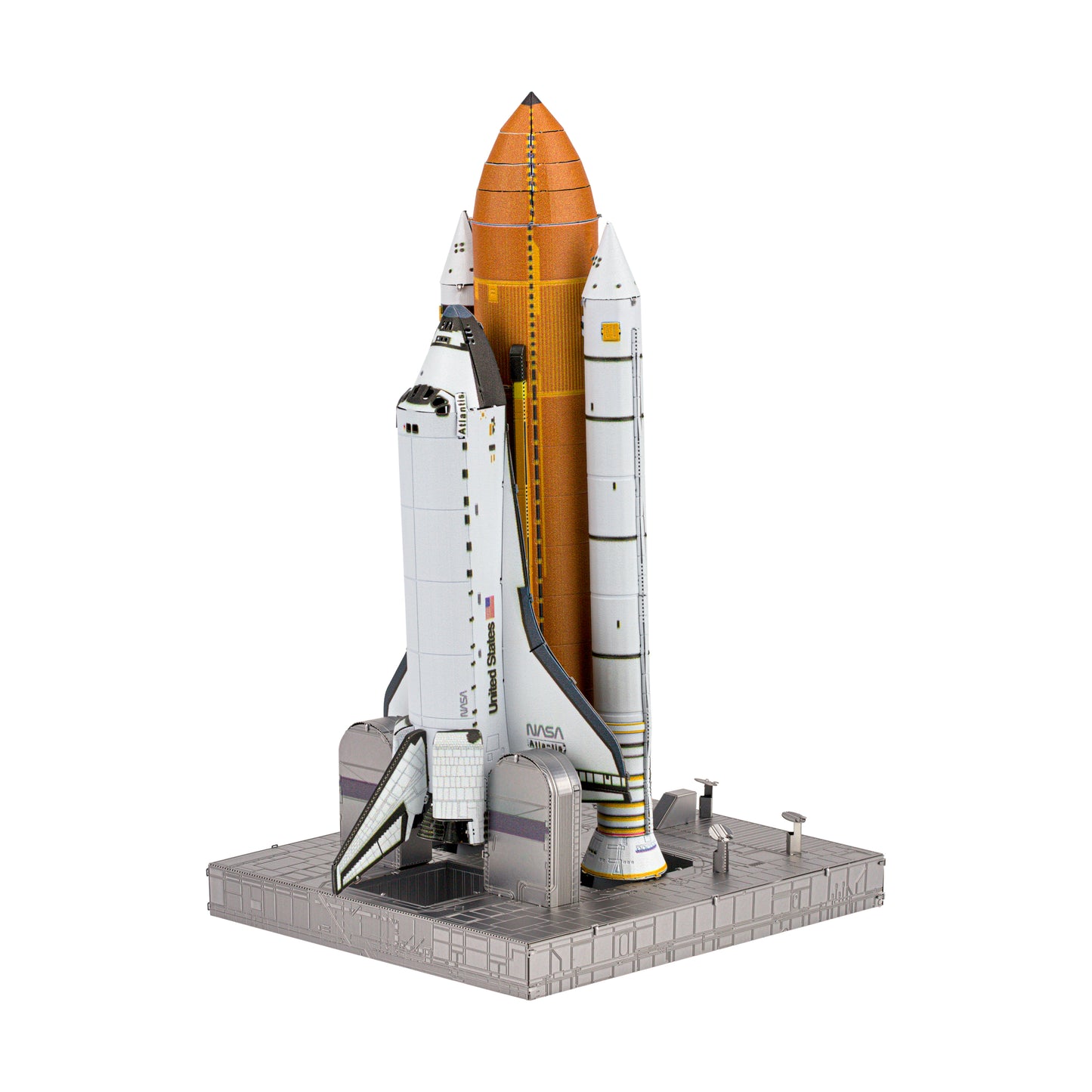 Metal Earth ICONX 3D Space Shuttle Launch model kit assembled and displayed on gray launch pad base, showing white orbiter with orange fuel tank and boosters