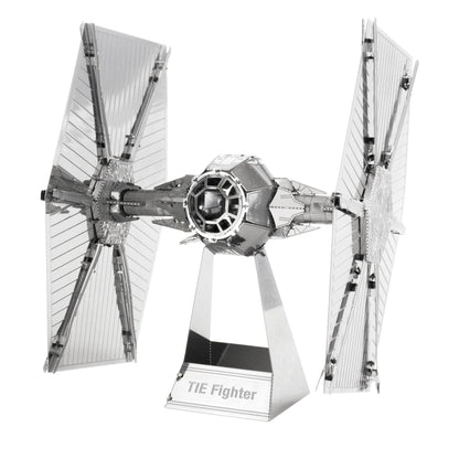 Metal Earth 3D Metal Model Kit TIE Fighter assembled model displayed on stand, showing detailed metallic construction with hinged solar panels and central cockp