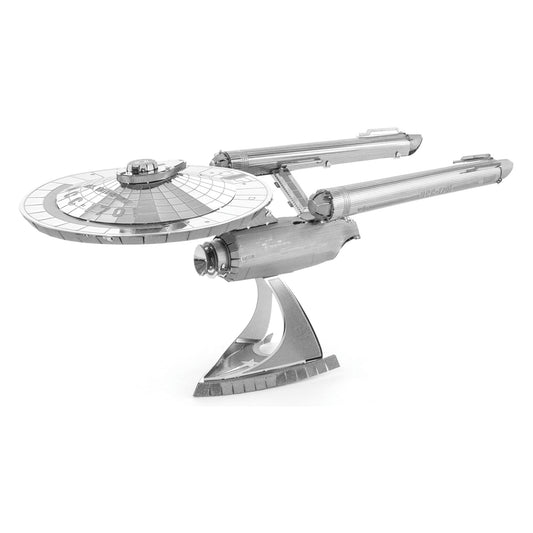 Metal Earth U.S.S. Enterprise 3D model kit, silver metallic spacecraft with saucer section, nacelles, and stand on plain background