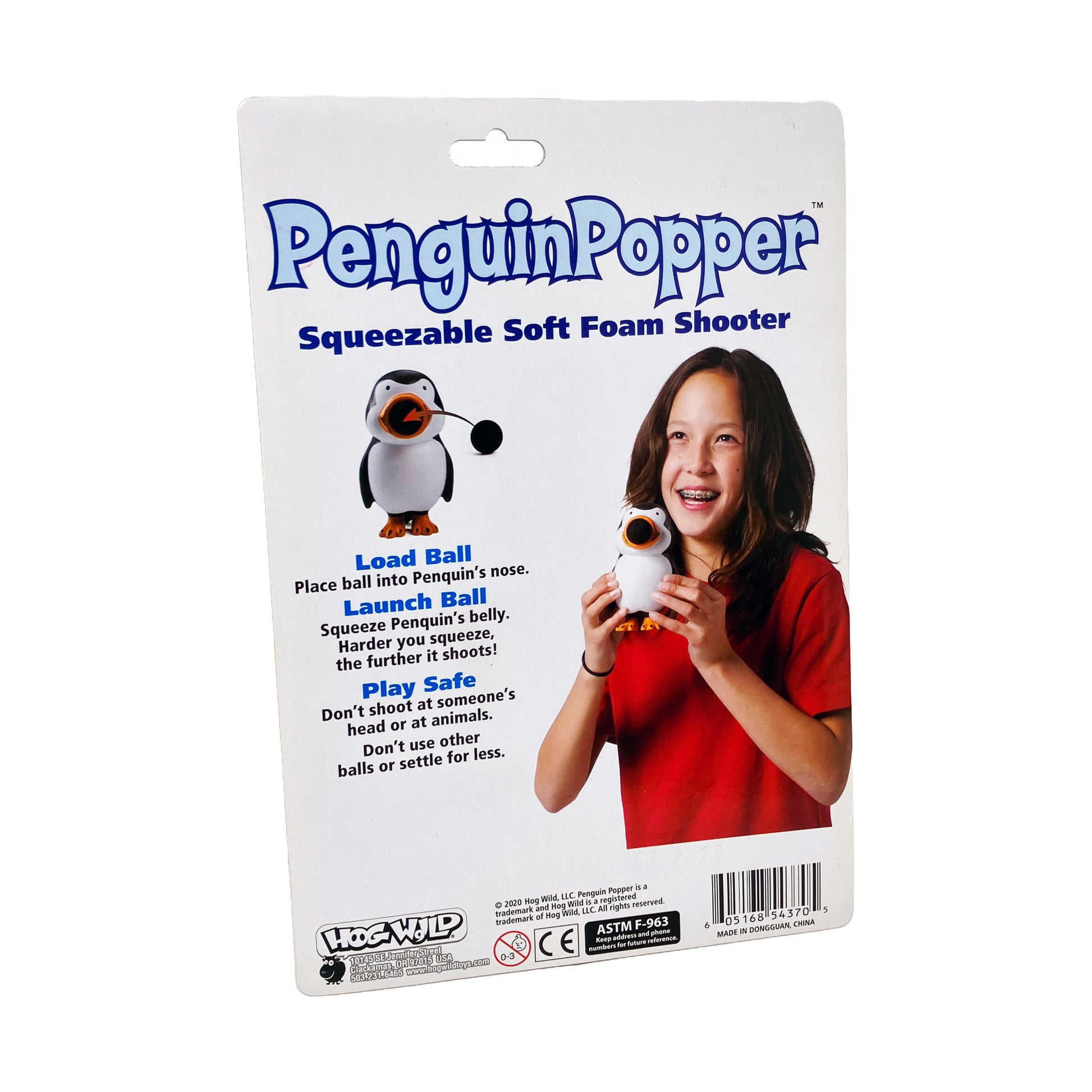Penguin Popper squeezable soft foam shooter toy with orange and black details