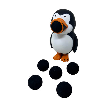 Penguin Popper toy with black and white body, orange beak and feet, shooting black balls