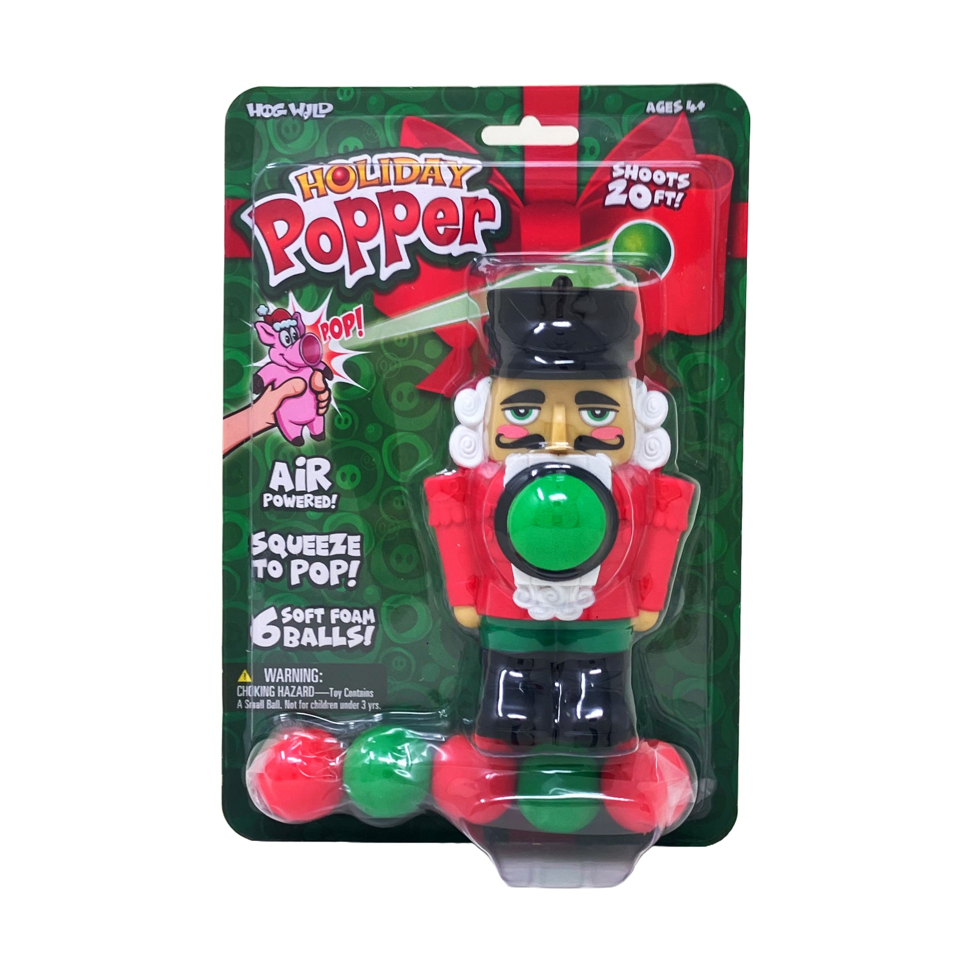 Holiday Popper Nutcracker foam ball launcher with red outfit, black hat, white beard, and green button on blister card packaging with 6 soft foam balls included