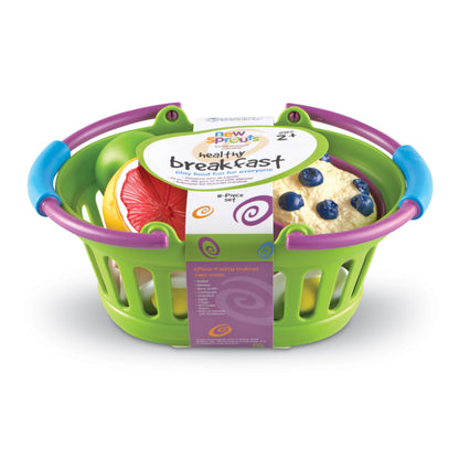 New Sprouts Healthy Breakfast playset with green basket, purple handles, and play food pieces including cereal bowl, fruit slices, and accessories