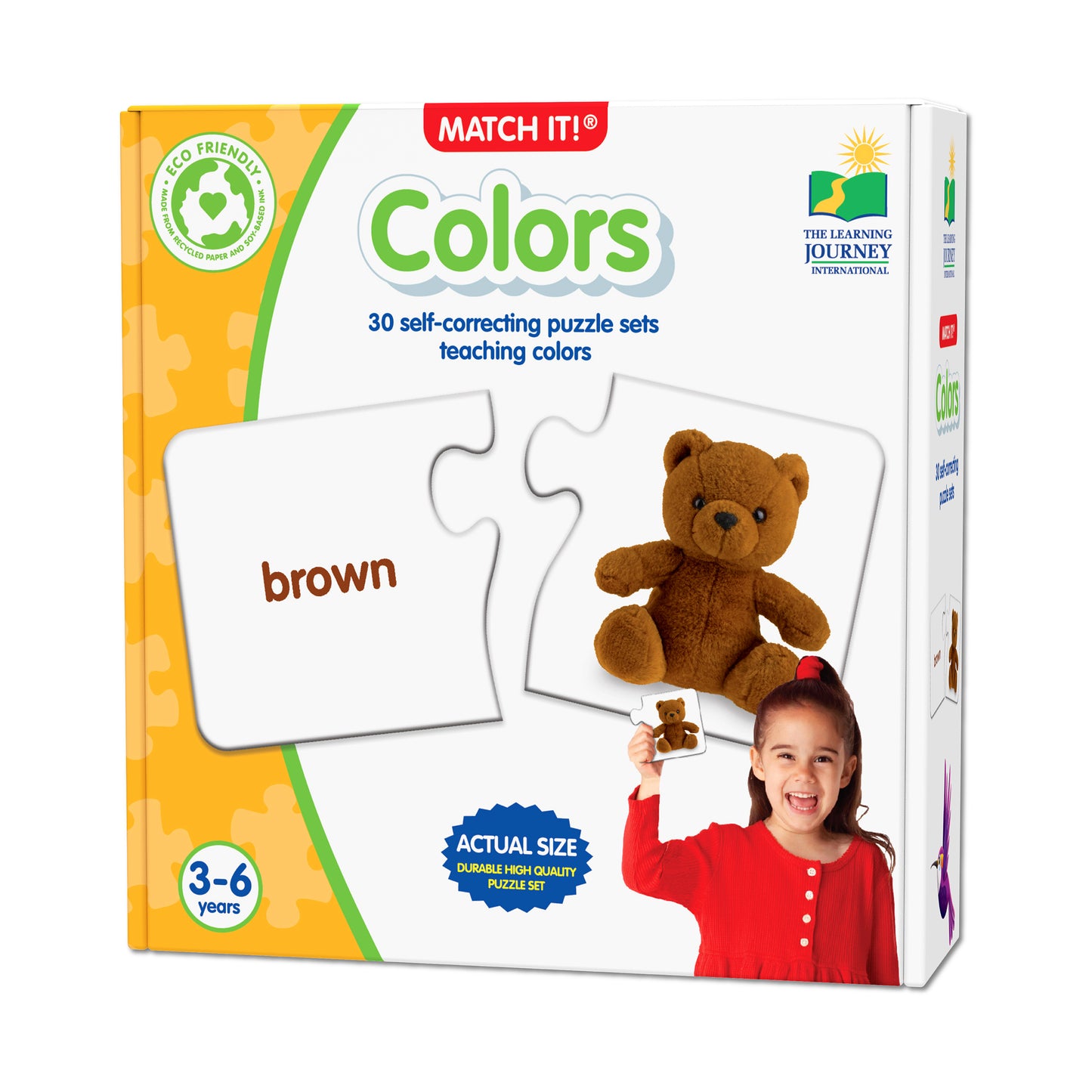 Match It! Colors puzzle set box showing brown teddy bear puzzle piece, word card labeled 'brown', and child on model holding small matching card, ages 3-6