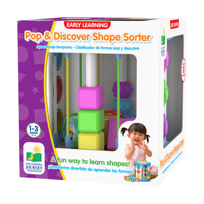 Early Learning Pop & Discover Shape Sorter packaging showing colorful stacked blocks in pink, green, and yellow with sorting pegs, modeled by a child
