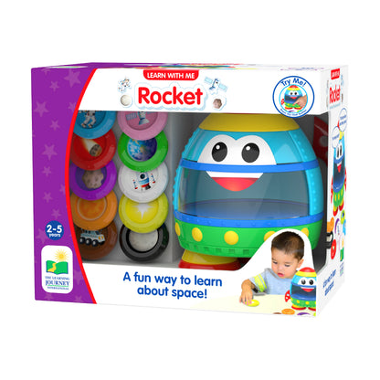 Learn with Me Rocket interactive toy with stacking rings, featuring a colorful rocket character with big eyes and yellow top, modeled by a child