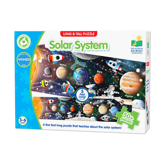 Long & Tall Solar System puzzle box showing 5-foot-long educational floor puzzle with 50+ pieces featuring planets, moons, rockets, and astronauts on a space ba