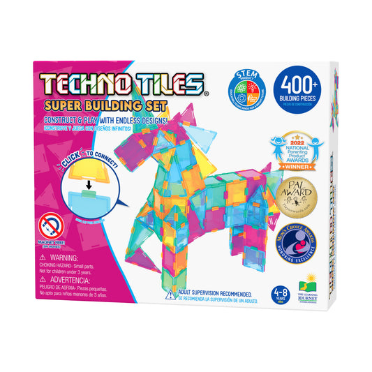 Techno Tiles Super Building Set box showing colorful interlocking plastic tiles in pink, blue, yellow, and orange assembled into a 3D structure, 400+ pieces, ag