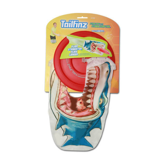 Tailfinz flying disc with red stabilizing tail and shark-shaped design, packaged on yellow and orange branded card backing