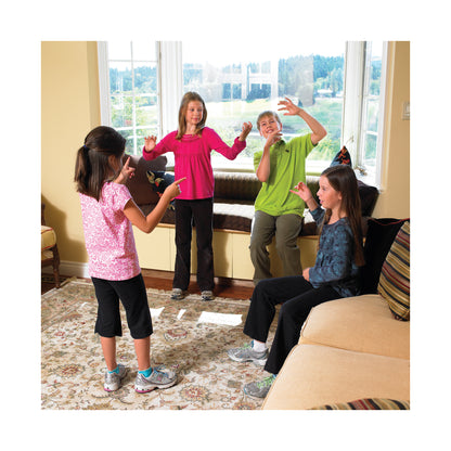 Picture Charades game with kids playing in living room, colorful clothing