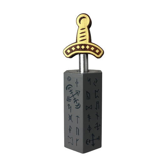 Wooden brainteaser puzzle featuring a gold sword with decorative hilt mounted on a black stone base carved with mystical symbols