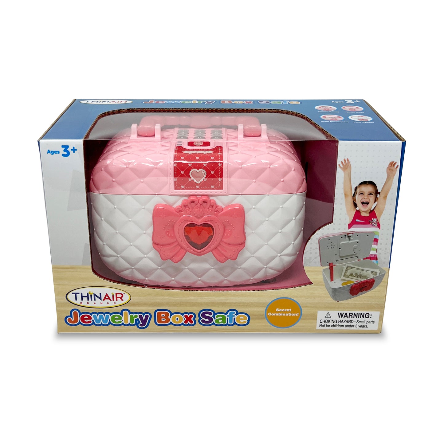 Thinair Jewelry Box Safe in pink and white with quilted design, heart-shaped latch, and red decorative bow on front, displayed in retail packaging for ages 3+