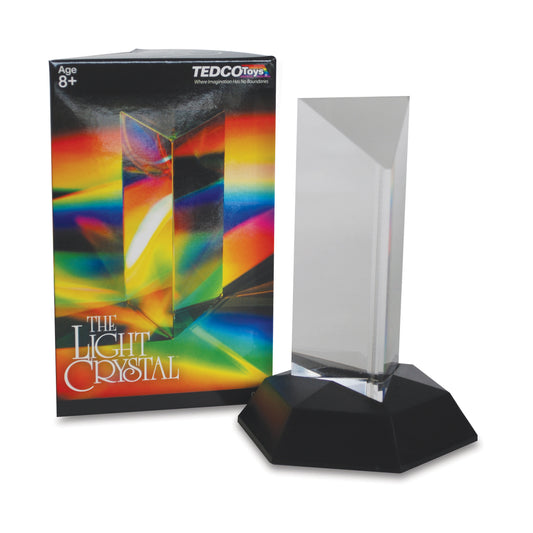 The Light Crystal prism toy with colorful rainbow refraction displayed next to its box packaging