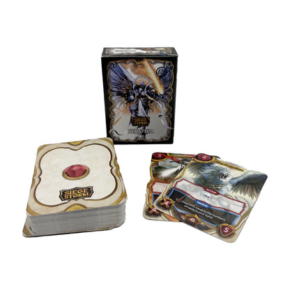 SiegeStorm Seraphia Faction Deck Expansion with box, cards, and game components featuring winged character artwork