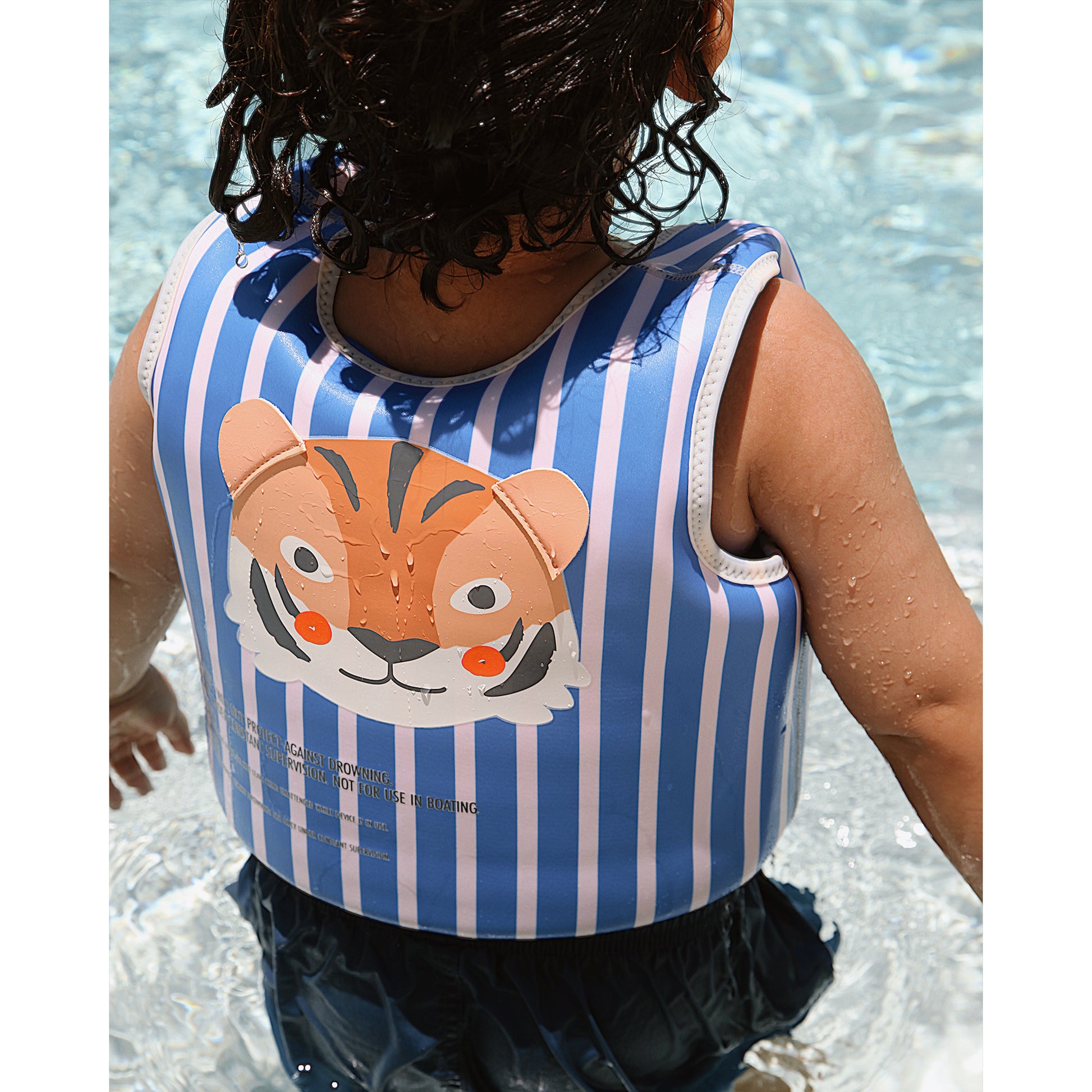 Float Vest 3-6 Tino the Tiger blue striped swim vest being worn in water