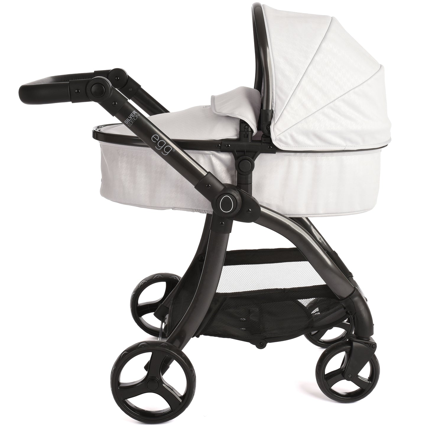 Roma Egg Doll Pram in white and black with reversible carrycot and modern frame