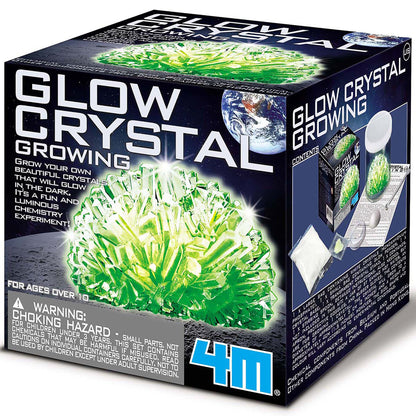 Glow Crystal Growing kit with glowing green crystal formation in dark