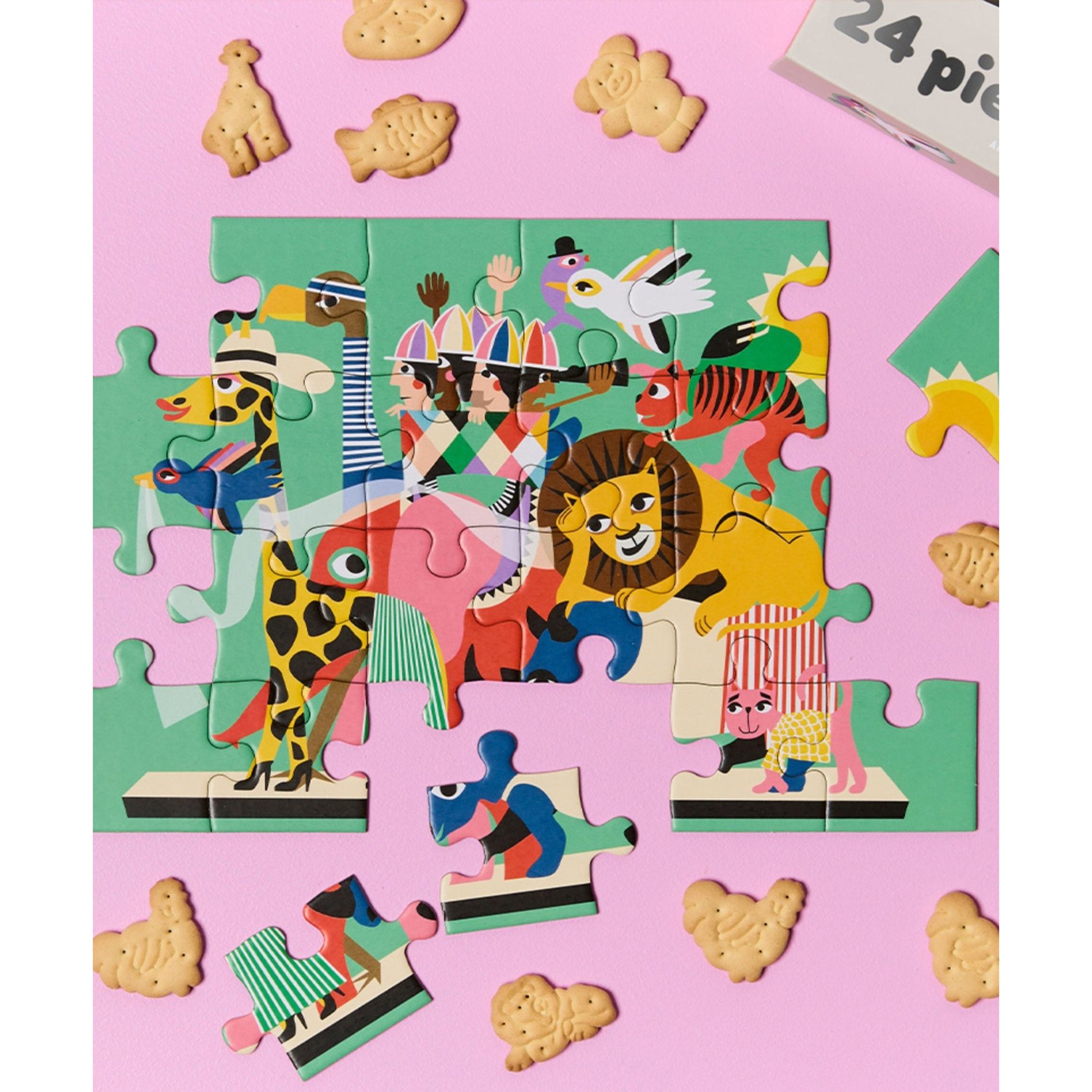 JOS 24 Piece Puzzle Animal Carnival with colorful circus animals on green and pink background