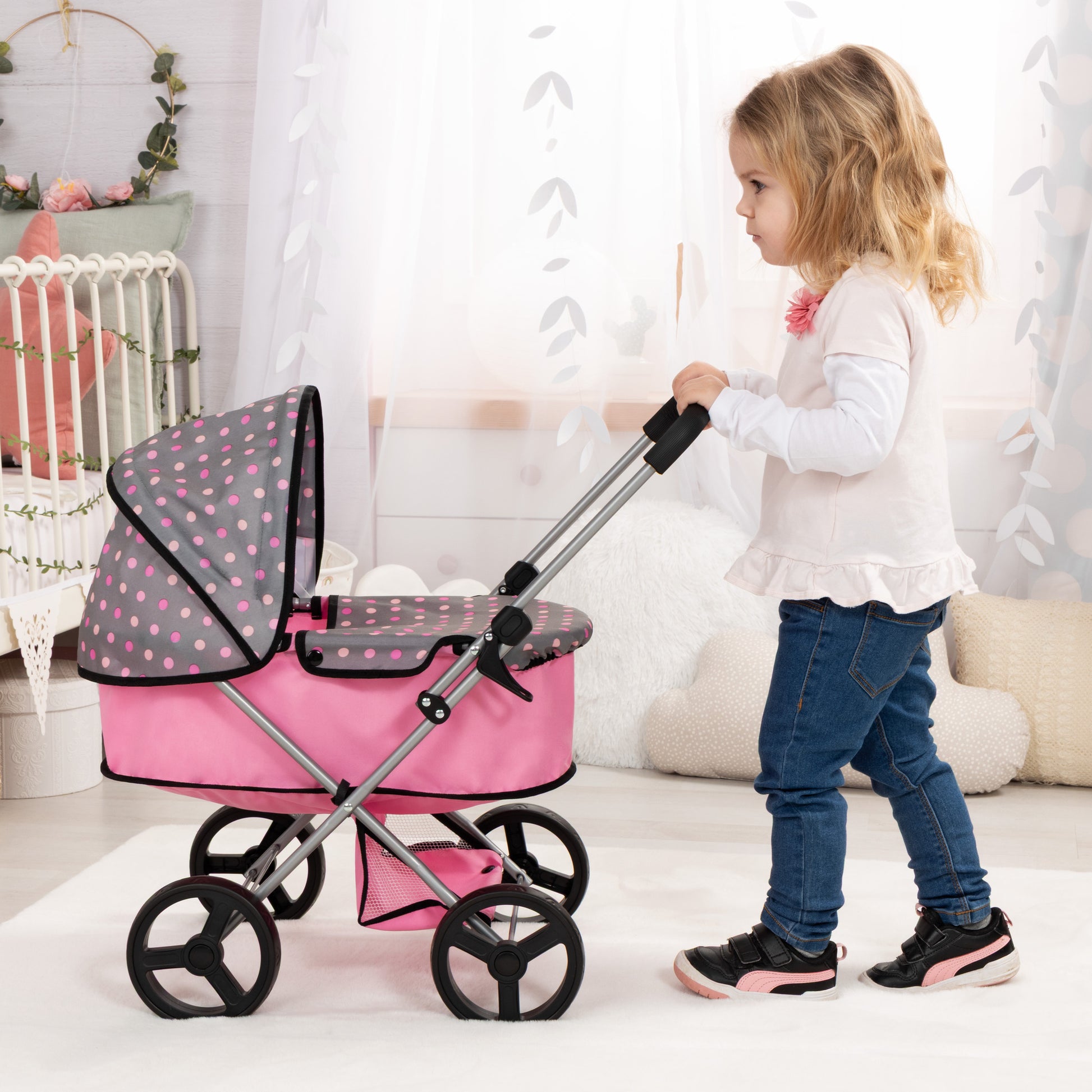 Bayer Design pink and grey polka dot doll pram with adjustable handle and shopping basket
