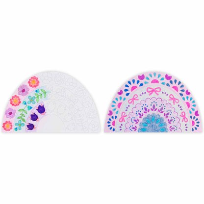Mixed Media Coloring Pad with rainbow-themed sheets showing before and after designs in pink, purple, and blue