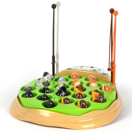 The Fishing Game: Dog Edition with colorful dog pieces, magnetic fishing rods, and green play board