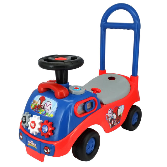 Red and blue Spidey Racer ride-on toy with black steering wheel, gray seat, blue push handle, activity buttons on front, and black wheels