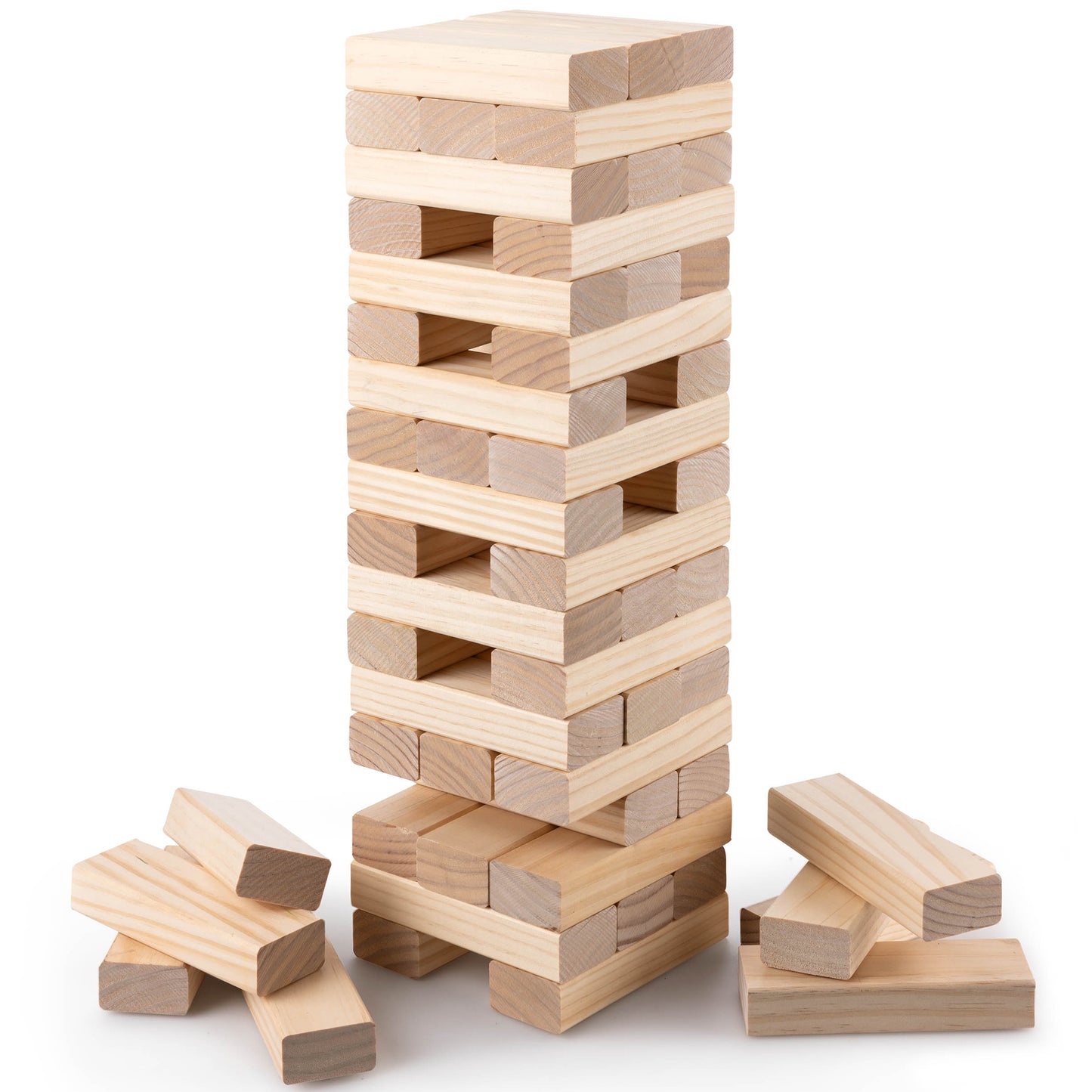 Tall wooden block stacking tower game with rectangular blocks in natural pine, some blocks removed and scattered at base